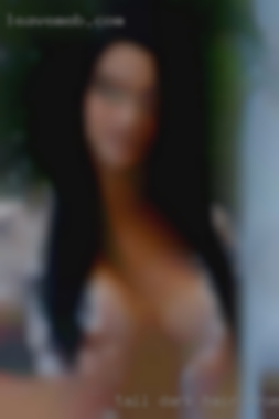 Tall, dark from Kentucky tonight hair, hazel eyes, and skinny.